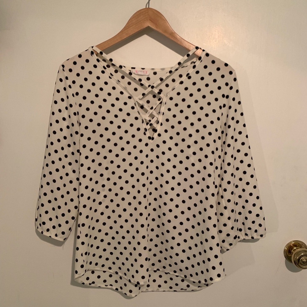 White with black polka dot top